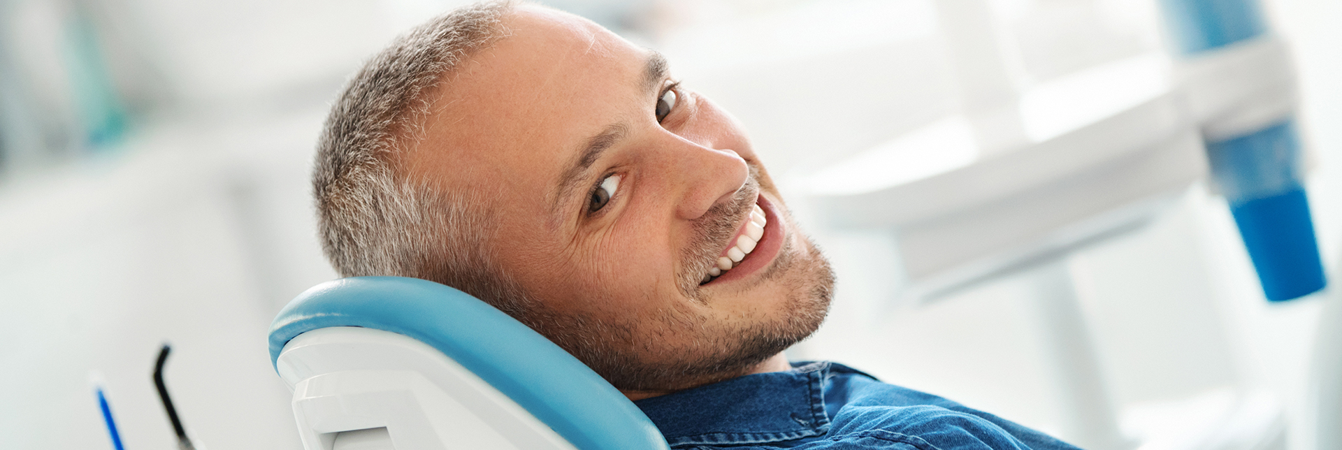 man smiling in dental chair, dentist in Hot Springs Village