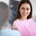 woman in dental chair, why see a prosthodontist