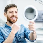 man getting dental care at a prosthodontist