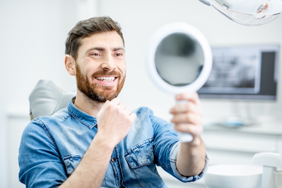man getting dental care at a prosthodontist